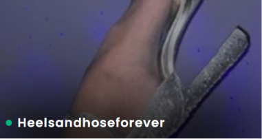 Real FeetFinder profile thumbnail showing a foot in a high stiletto heel and sheer hosiery against a purple background, username Heelsandhoseforever at the bottom